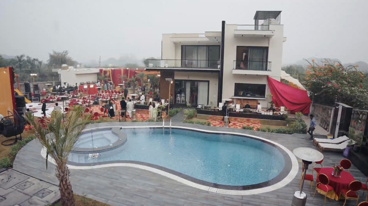 Aerial view of poolside event at Sidneyland Hill Retreat