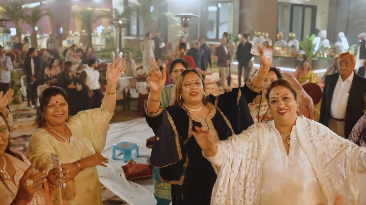 Guests dancing at night event at Sidneyland Hill Retreat